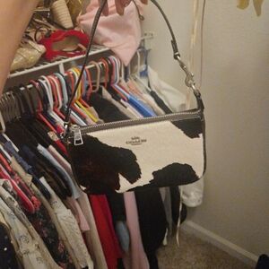 Coach Black and White Cow Print Wristlet